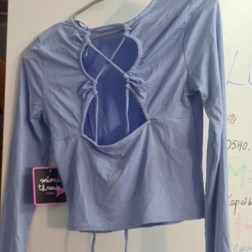 Stretchable top. Sexy back. Size: S